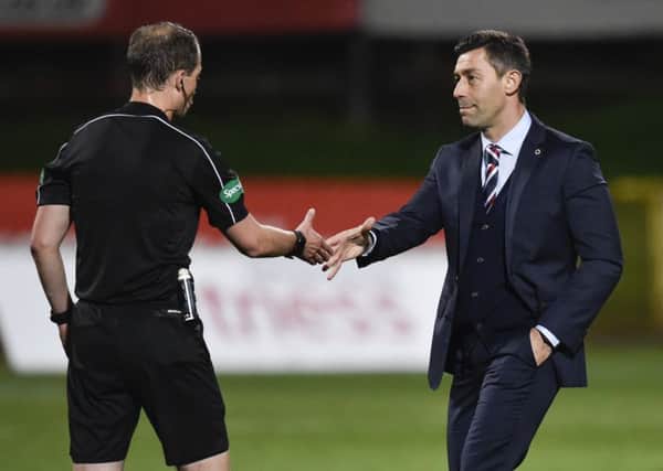 Rangers manager Pedro Caixinha (right) with referee Willie Collum at full-time on Friday. Picture: SNS