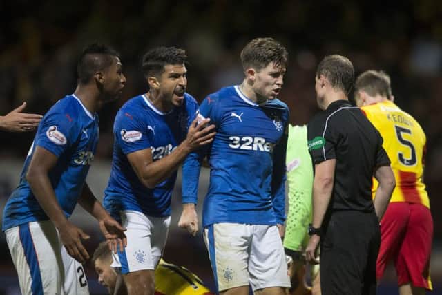 Rangers' Josh Windass (centre) has been found not guilty by the SFA of making an offensive gesture. Picture: PA