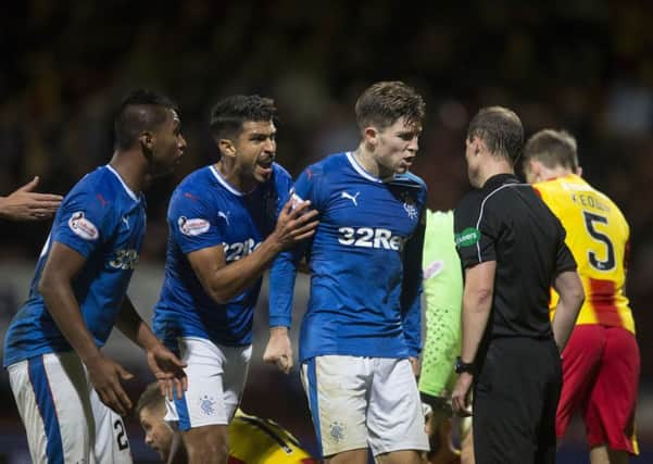 Rangers' Josh Windass (centre) has been found not guilty by the SFA of making an offensive gesture. Picture: PA