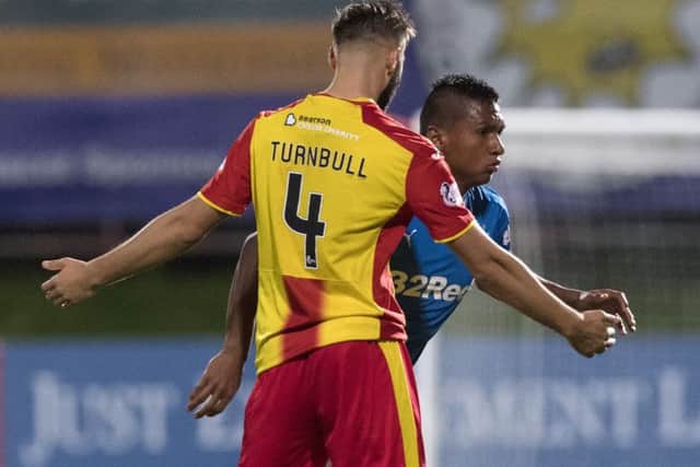 Rangers' Alfredo Morelos (right) clashes with Jordan Turnbull. Picture: SNS