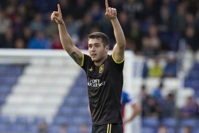 Playing at centre-half in the league victory  at Inverness on Saturday, Livingstons Nikolay Todorov celebrates his goal. Picture: SNS