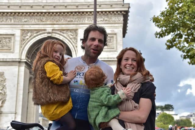 The 34-year-old Scotsman set a new world record for circumnavigating the globe on a bike when he arrived at the Arc de Triomphe in Paris today. Picture: Getty Images