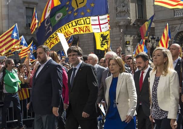 Catalan ministers march in support of the referendum, which has been ruled illegal by Spains constitutional court. Picture: Getty Images
