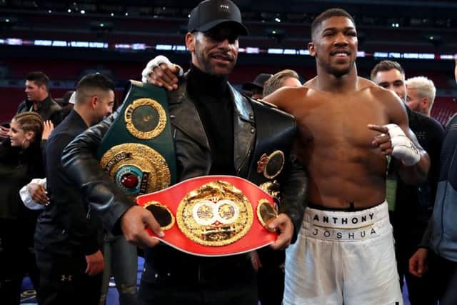 Rio Ferdinand, left, with Anthony Joshua after a fight in April 2017. Picture: PA