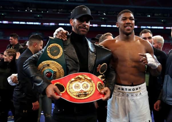 Rio Ferdinand, left, with Anthony Joshua after a fight in April 2017. Picture: PA