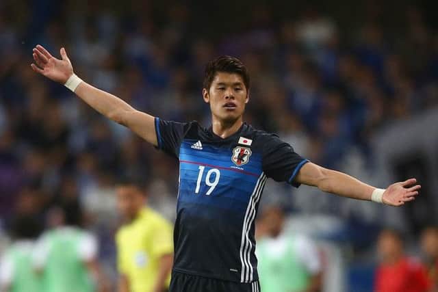 Hiroki Sakai gestures during a match between Japan and the United Arab Emirates. Picture: Getty Images
