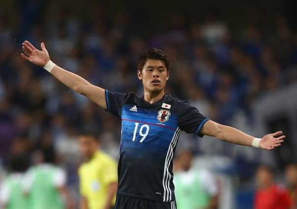 Hiroki Sakai gestures during a match between Japan and the United Arab Emirates. Picture: Getty Images