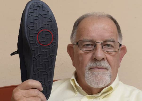Sam Purdie, 81, from Perth, bought these pair of slippers which appeared to have a Swastika pattern on the sole.