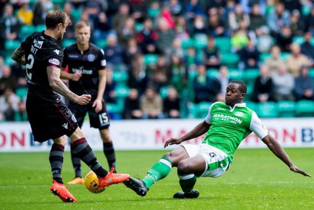 Richard Tait believed he was fouled by Marvin Bartley, right (incident in question not pictured). Picture: SNS