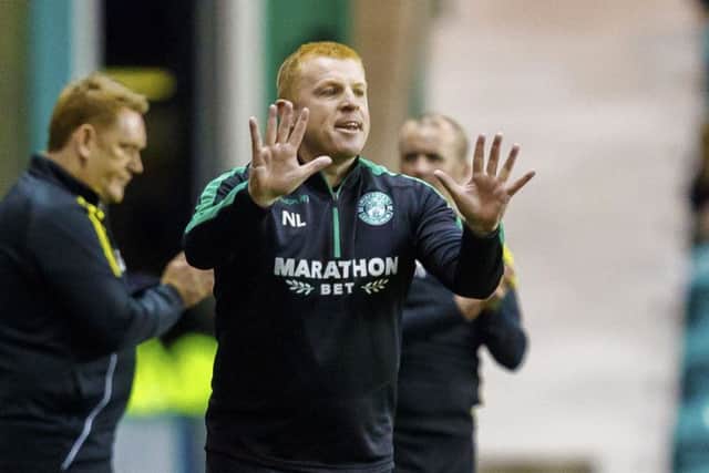 Neil Lennon praised the character of his Hibs team after defeating Livingston. Picture: SNS.