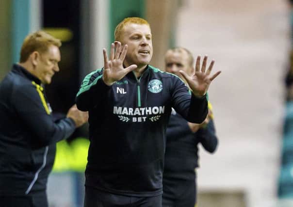 Neil Lennon praised the character of his Hibs team after defeating Livingston. Picture: SNS.