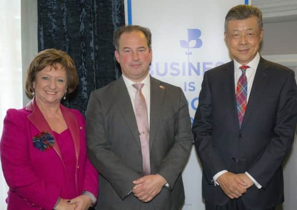 SCC chief Liz Cameron with president Tim Allan and Liu Xiaoming, China's ambassador to the UK. Picture: Peter Devlin