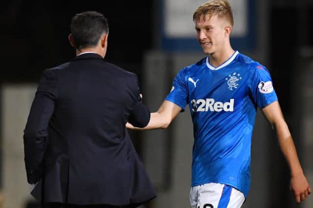 Rangers manager Pedro Caixinha (left) with Ross McCrorie. Picture: SNS