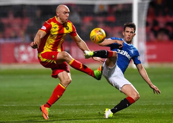 Rangers' Ryan Jack (right) competes with Conor Sammon. Picture: SNS