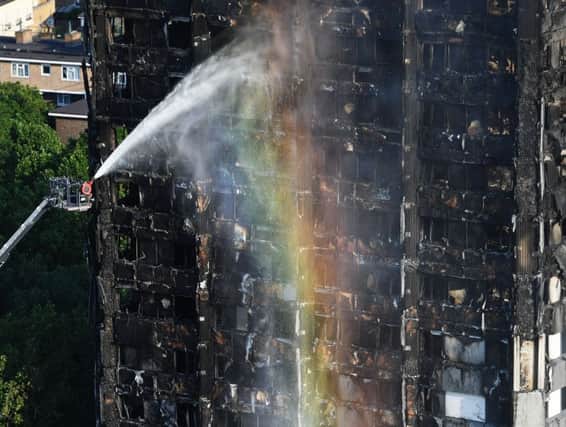Fire fighters tackle the Grenfell fire