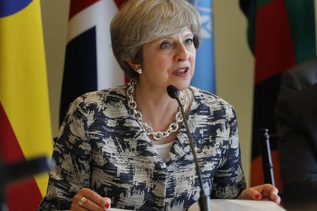 Theresa May joined world leaders in pushing internet companies to tackle online extremism. Picture: AP