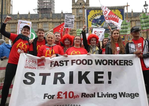 Staff from McDonald's restaurants rally after voting  in favour of industrial action amid concerns over zero-hour contracts. Picture: Philip Toscano/PA