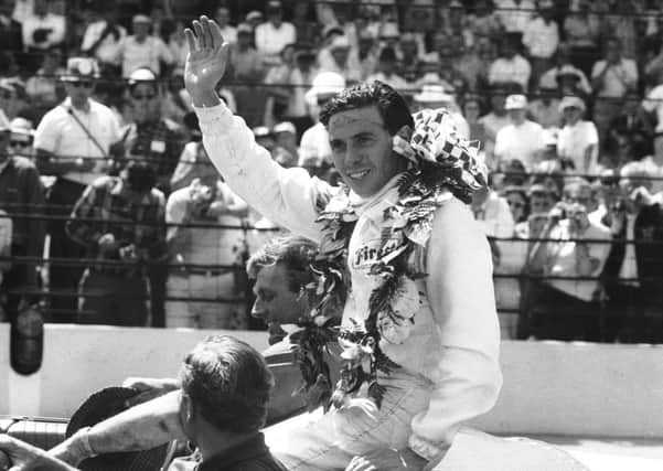 Jim Clark celebrates winning the Indianapolis 500 in 1965. He remains the only man to win the Indy 500 and the Formula One world championship in the same season. Picture: Harry Benson/Express/Getty Images