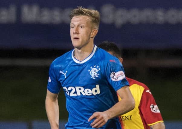 Ross McCrorie made his debut for Rangers as a substitute  in the 3-1 Betfred Cup win at Partick Thistle