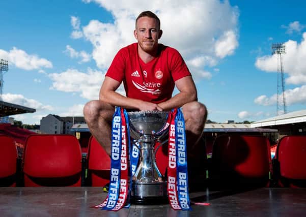 Adam Rooney says the Aberdeen squad is the strongest he has known during his time at the club. Picture: SNS