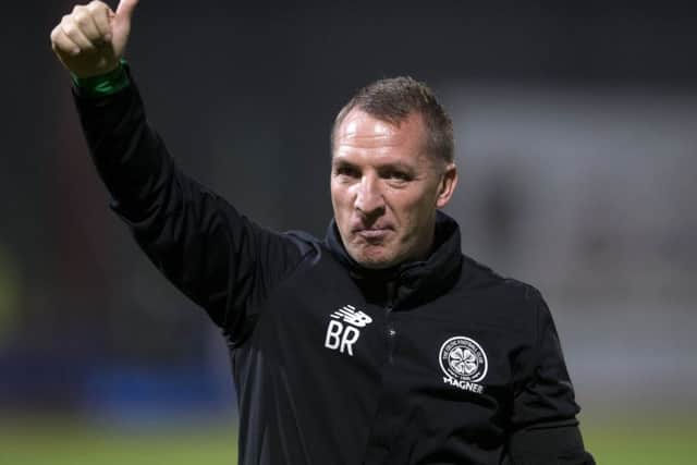 Celtic manager Brendan Rodgers celebrates after the 4-0 victory over Dundee. Picture: Jeff Holmes/PA Wire