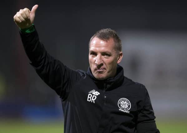 Celtic manager Brendan Rodgers celebrates after the 4-0 victory over Dundee. Picture: Jeff Holmes/PA Wire