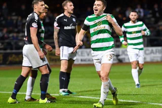 James Forrest celebrates having doubled Celtic's advantage. Picture: SNS