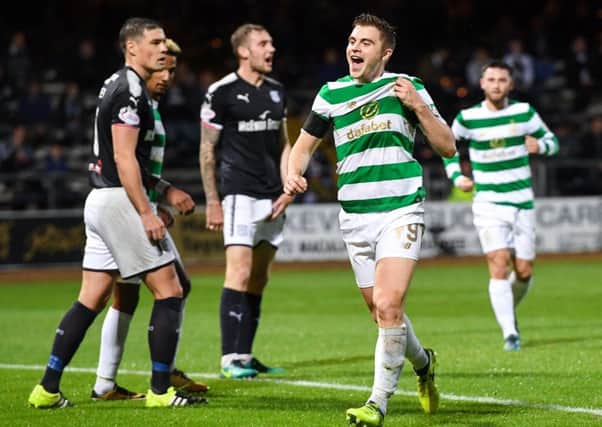 James Forrest celebrates having doubled Celtic's advantage. Picture: SNS