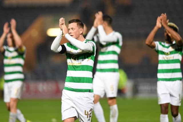 Celtic's players applause their fans at full-time. Picture: SNS