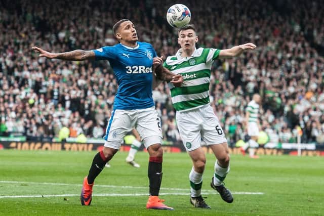 Kieran Tierney and James Tavernier battle for possession in an Old Firm match. Picture: John Devlin