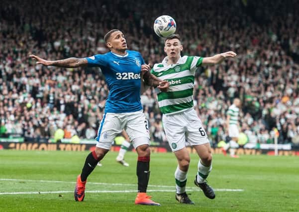 Kieran Tierney and James Tavernier battle for possession in an Old Firm match. Picture: John Devlin