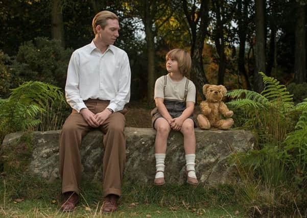 Domhnall Gleeson as AA Milne and Will Tilston as Christopher Robin in Goodbye Christopher Robin