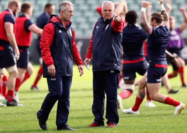 British & Irish Lions head coach Warren Gatland, right, with attack coach Rob Howley during a training session in Auckland.  Picture: David Rogers/Getty