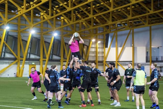 The Glasgow squad go through a lineout drill at Ravenscraig's indoor facility ahead of tonight's top of Conference A clash with Munster. Picture: SNS
