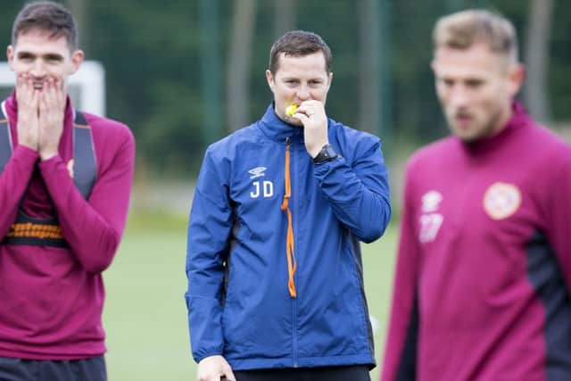 Hearts coach Jon Daly supervises training as head coach Craig Levein takes a back seat. Picture: SNS.