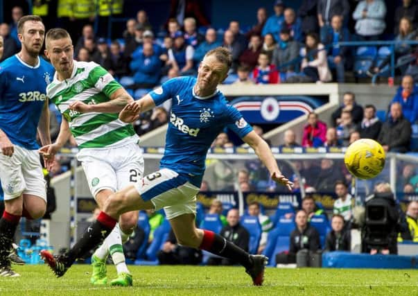 Celtic's Mikael Lustig scores his side's fifth goal in the last Old Firm game. Picture: Paul Devlin