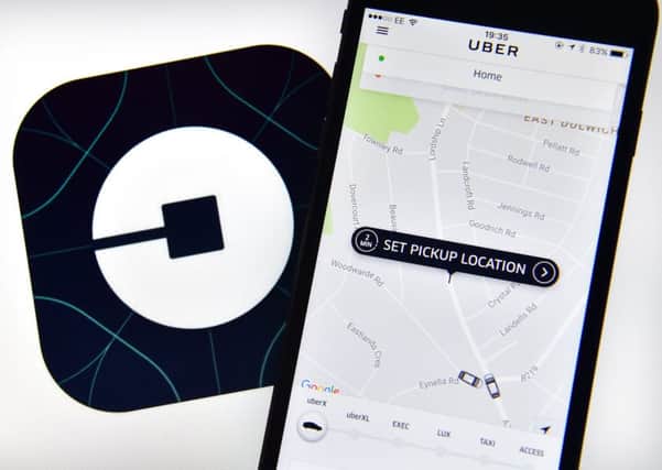 Councils have dismissed the need for a review of Uber's operations in Scotland. Picture: Carl Court/Getty Images