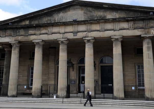 Tory councillor Michael Jamieson appeared from custody at Perth Sheriff Court to face a charge of possessing indecent images at his Buchan Drive home. Picture: Ian Rutherford
