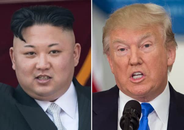 An escalating war of words between Donald Trump and Kim Jong-Un ratcheted up a notch as the US president dubbed North Korea's leader a "madman".
 Picture: SAUL LOEB,ED JONES/AFP/Getty Images