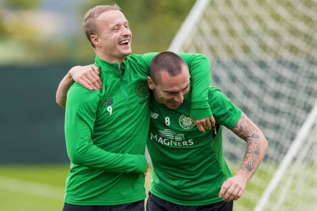 Celtic captain Scott Brown, right, plays it for laughs with team-mate Leigh Griffiths during training. Picture: SNS.