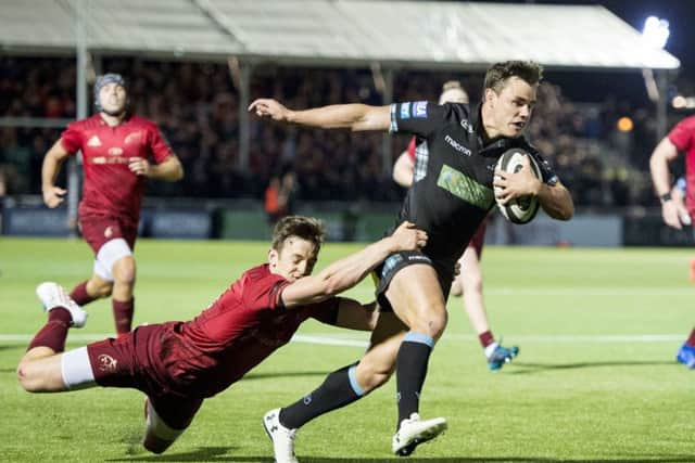 Lee Jones finishes off a superb eighty-yard move to score Glasgow Warriors second try. Picture: SNS/SRU.