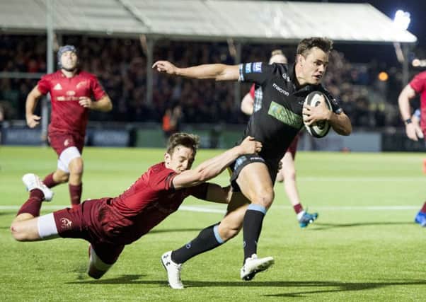 Lee Jones finishes off a superb eighty-yard move to score Glasgow Warriors second try. Picture: SNS/SRU.