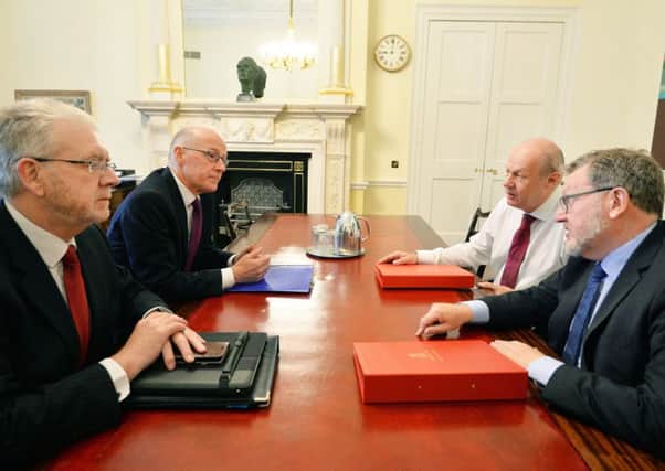 Mike Russell and John Swinney meet with First Secretary of State Damian Green and David Mundell at Whitehall. Picture: PA