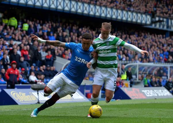 James Tavernier and Leigh Griffiths battle it out. Picture: Mark Runnacles/Getty Images