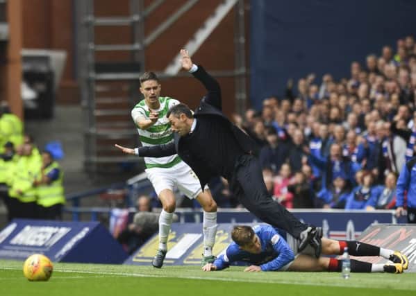 Rangers manager Pedro Caixinha is taken out by Josh Windass. Picture: SNS/Craig Williamson