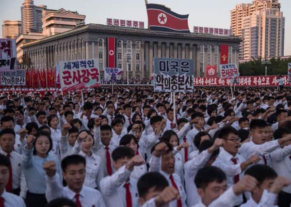 Students march in Pyongyang yesterday in support of leader Kim Jong-un. Photograph: AFP/Getty
