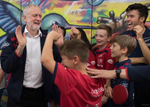 Jeremy Corbyn with members of Brighton Table Tennis Club on eve of party conference. Picture: PA