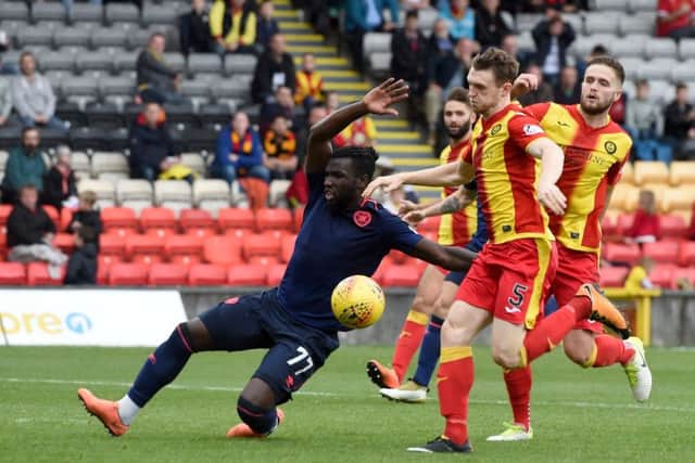 Hearts Esmael Goncalves in action against Niall Keown. Picture: SNS/Craig Foy
