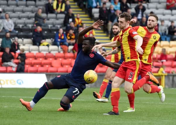 Hearts Esmael Goncalves in action against Niall Keown. Picture: SNS/Craig Foy
