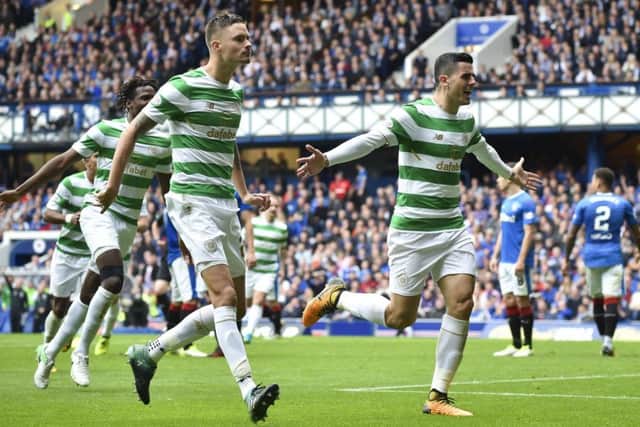 Tom Rogic celebrates after opening the scoring at Ibrox. Picture: SNS/Bill Murray
